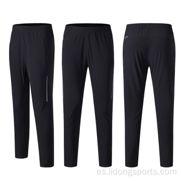 Pantalones de pista de corredera de entrenamiento sincero y seco